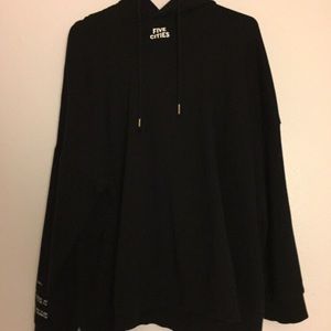 Black H&M hoodie with design on the back